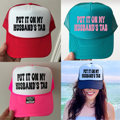 Put It On My Husbands Tab Trucker Hat